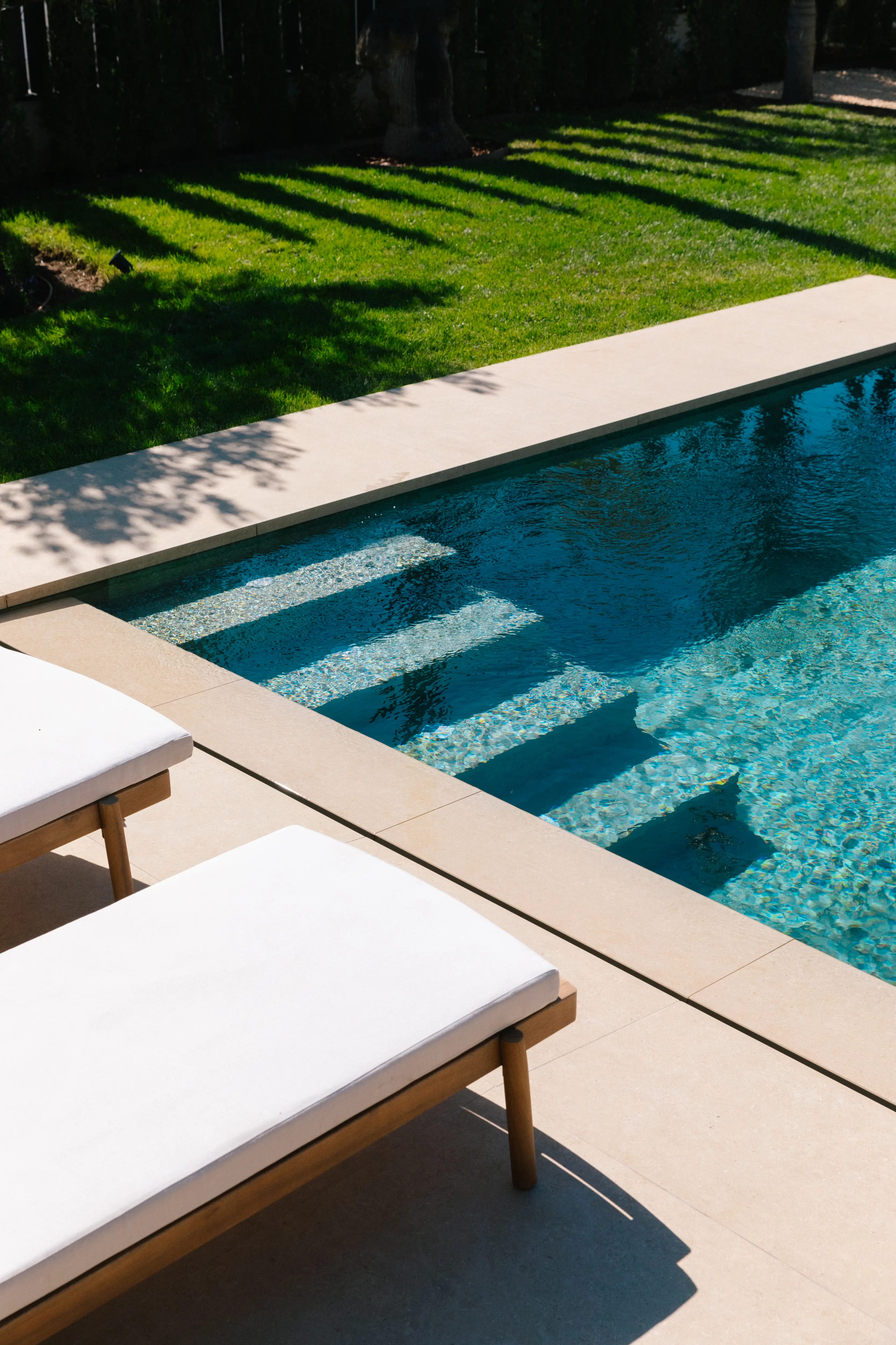 Outdoor terrace and pool area after reforma de villa in Campolivar Valencia image 79